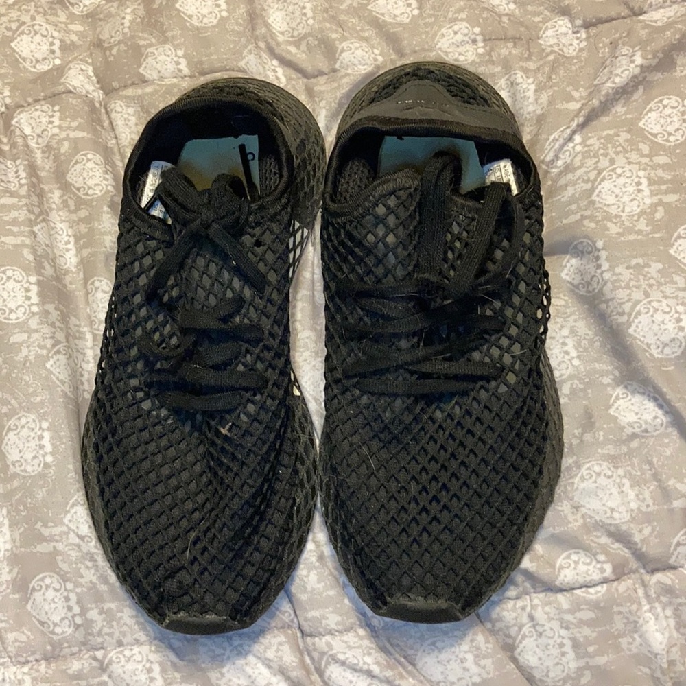 Black adidas mesh.